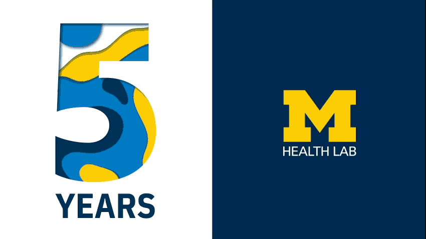 Number 5 with year underneath next to a block M