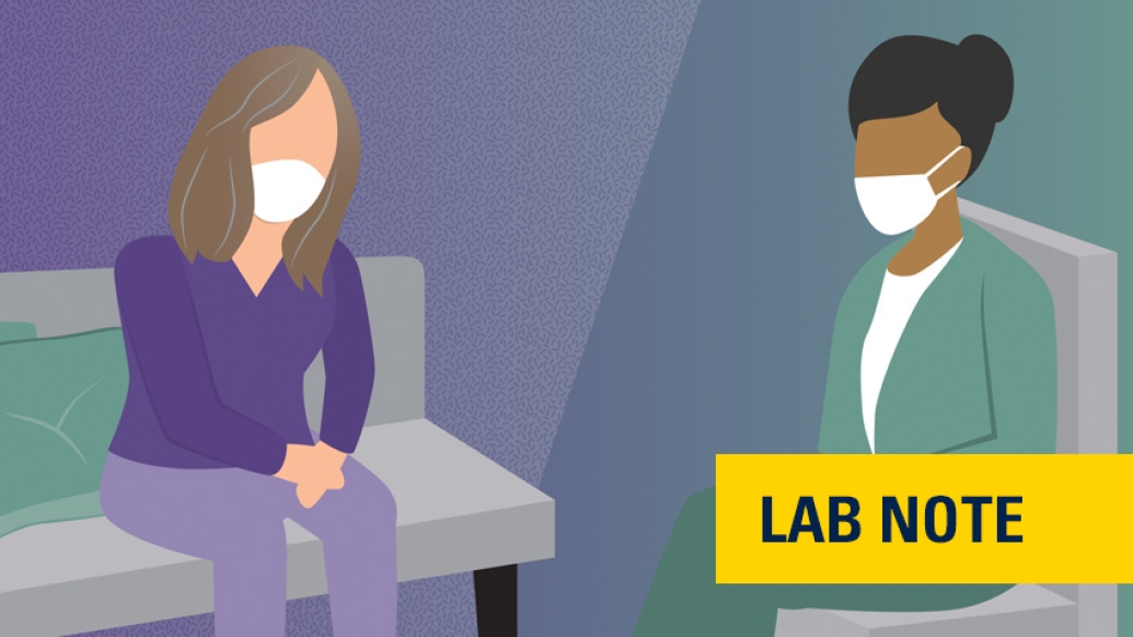 therapist with patient on couch in purple and sage green