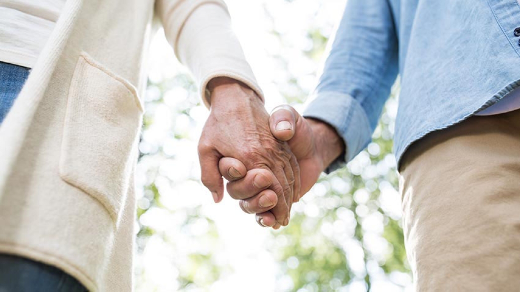 Couple holding hands