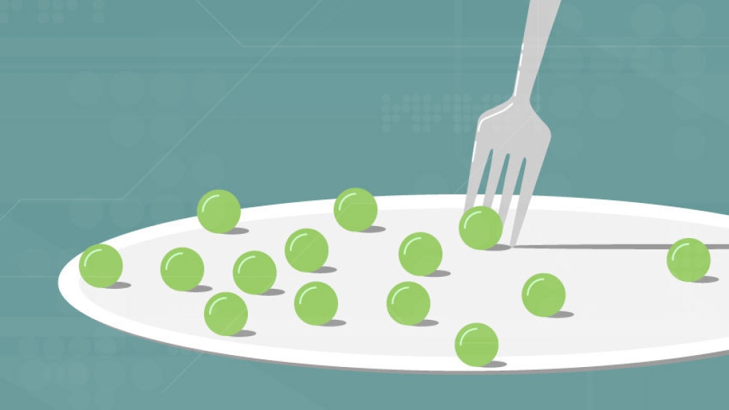 Plate of peas on plate