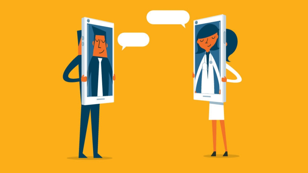 two people standing with phones over their faces with orange background