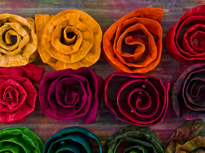 colorful fabric rolled up on the table
