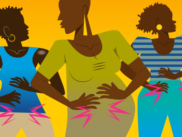 Women holding their stomachs