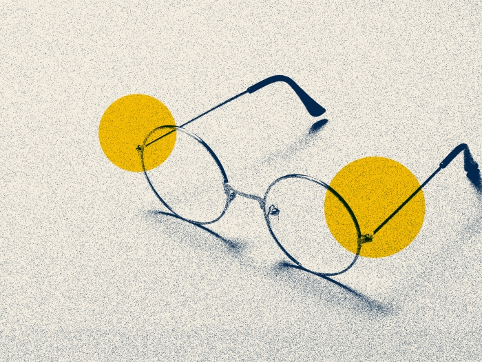eye glasses blue two yellow dots 