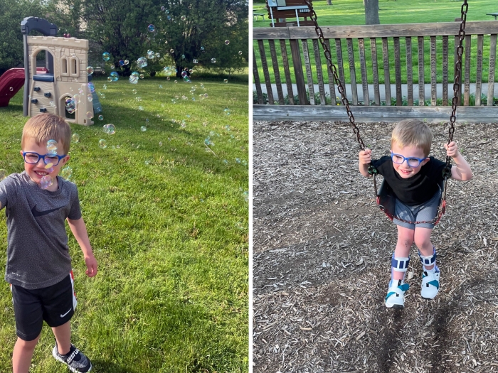 little boy playing outside with glasses on