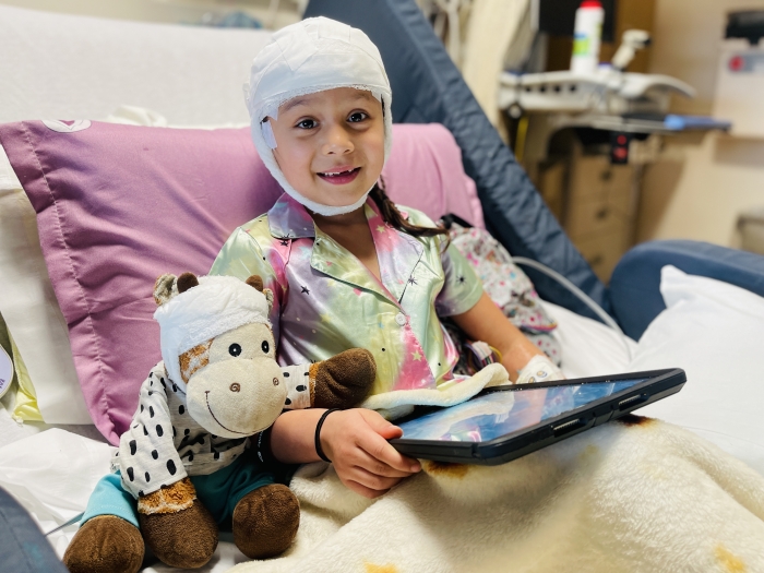 Mott patient using iPad during hospital stay