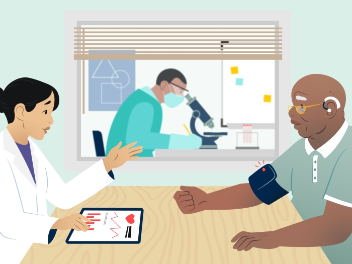 physician talking to patient with lab researcher in background