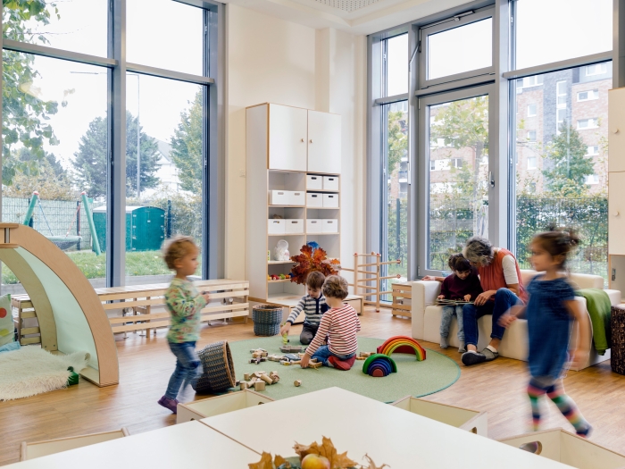 daycare kids running around in room