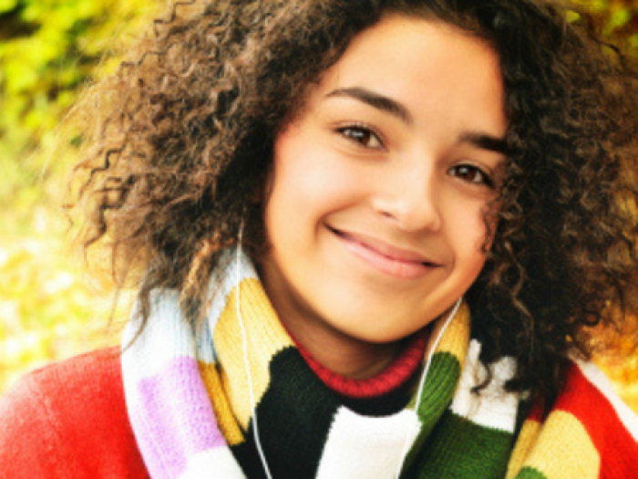 teen girl smiles at camera