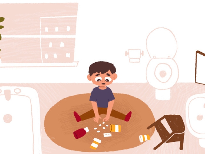child on floor bathroom with pills pink light orange 