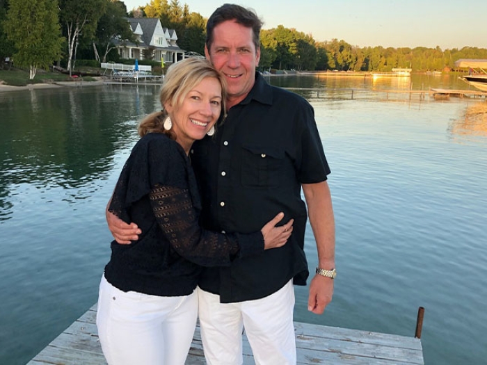 Couple posing on dock