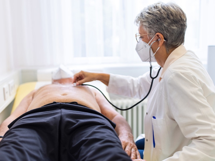 doctor mask stethoscope patient chest