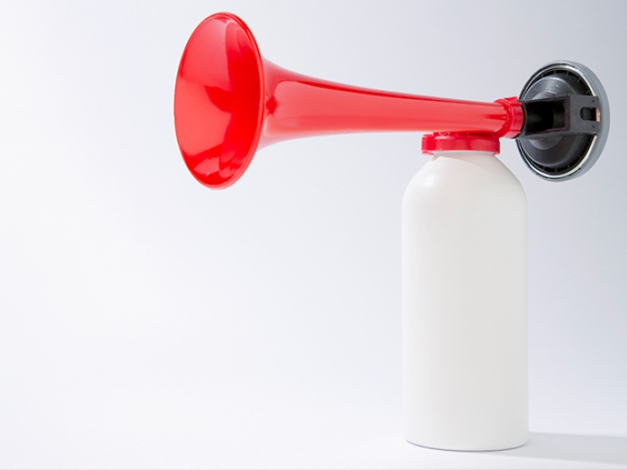 red air horn white room