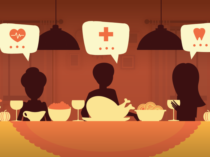 A family discussing their family's medical history at Thanksgiving