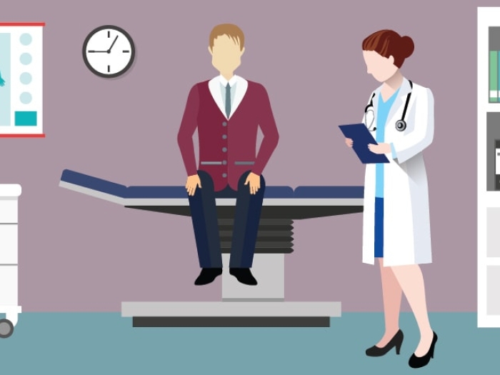 image of guy with female doctor in doctor's office