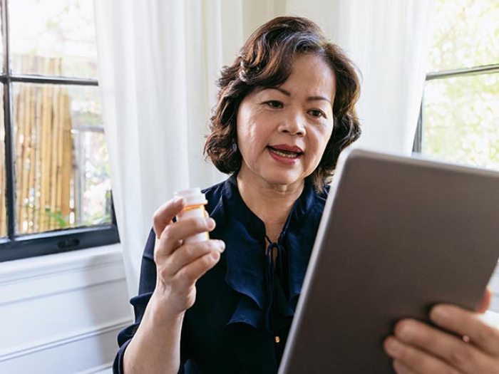 Women talking to doctor via teleconference