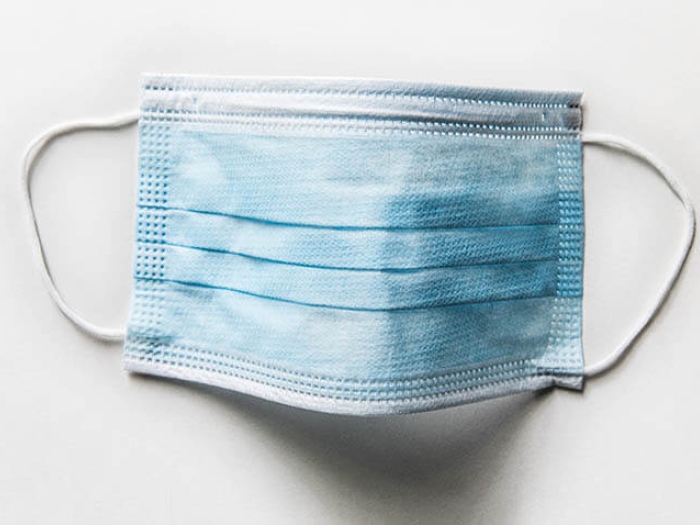 Blue mask on white table