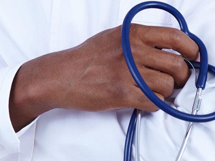 doctor holding stethoscope