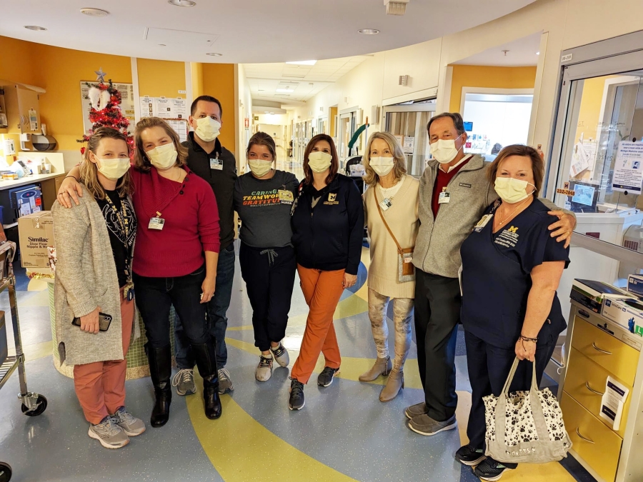 Carrie and Jason Hockstra Pictured with the U-M nurses who cared for their daughter, Clara