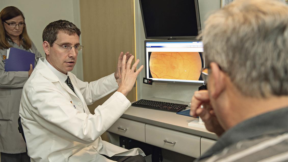 Doctor speaking with a patient