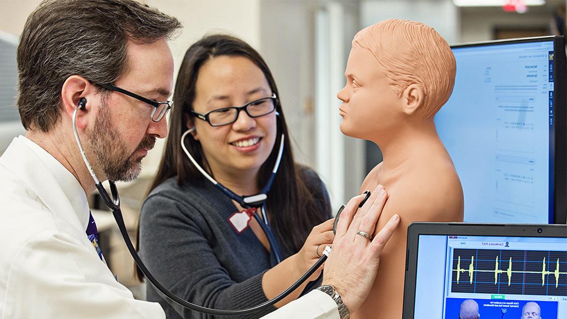 Doctors performing simulation exam