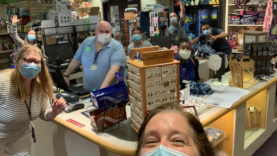 Friends Gift Shops employees pose for a photo