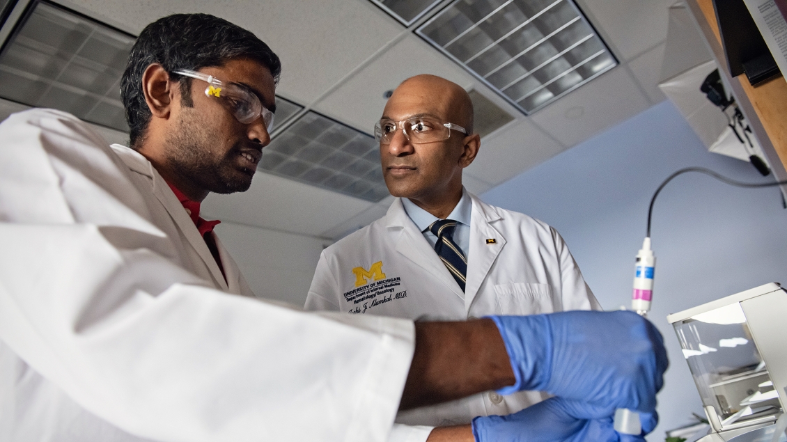 physicians working in lab